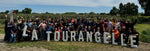 La Tourangelle spelled out while being held by team members of La Tourangelle Company.