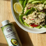 A delicious bowl of chicken salad sitting next to a can of La Tourangelle Extra Virgin Avocado Oil